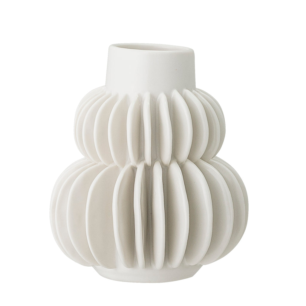 small white ceramic vase with petal details