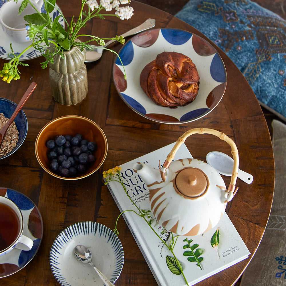 rustic table setting with made in Japan tableware handcrafted neutral shades of brown and blue